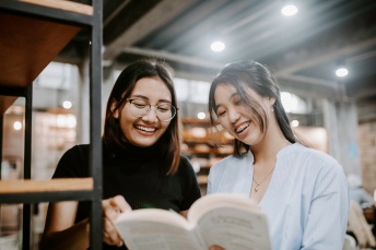 Students reading together